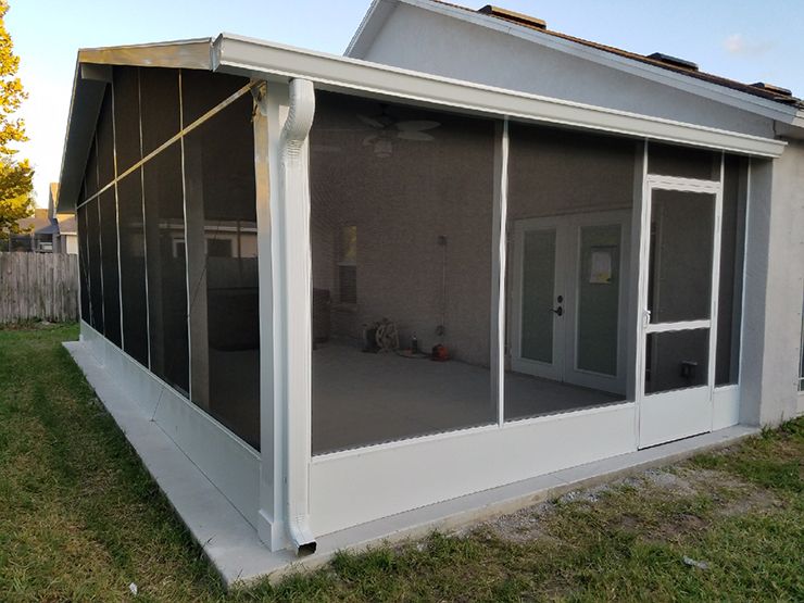 Gable screen room with 8 x 8 corner columns and concrete patio