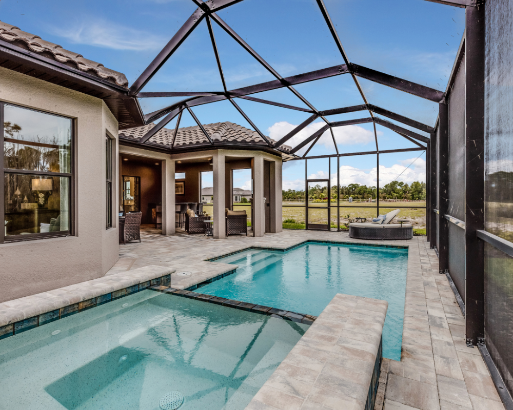 Florida Unground Swimming Pool Florida inground swimming pool in the Tampa Bay area with spa and paver patio.