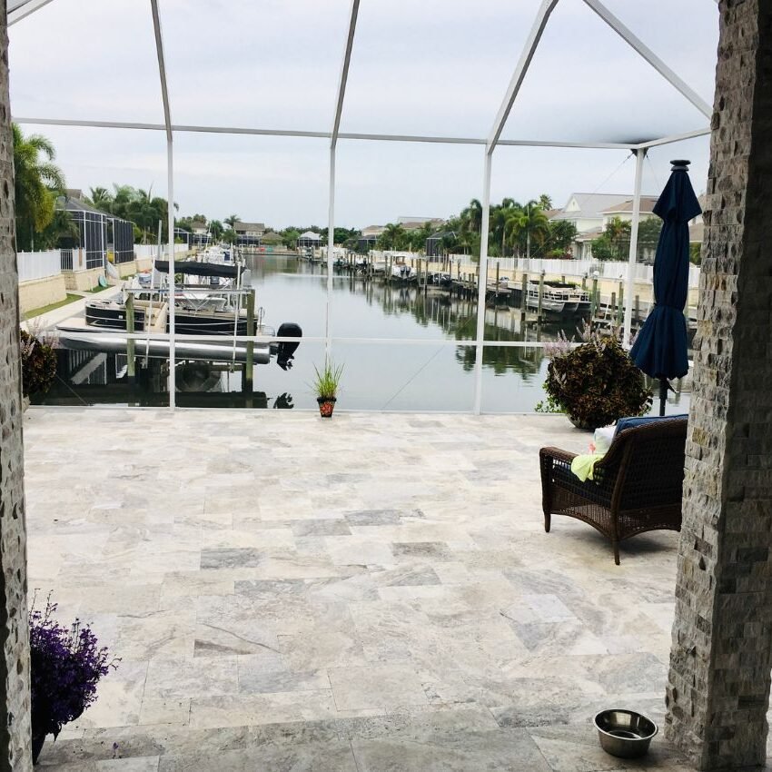 Patios Riverview an enclosed patio looking at a river